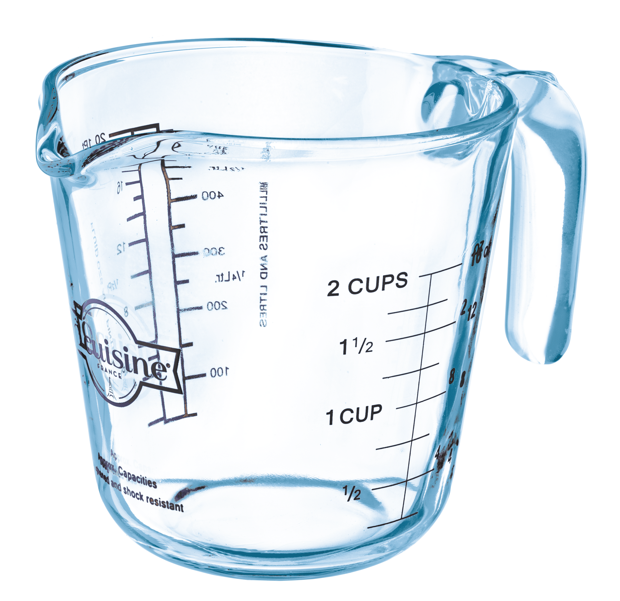 Clear ÔCuisine glass measuring jug with volume markings on a white background