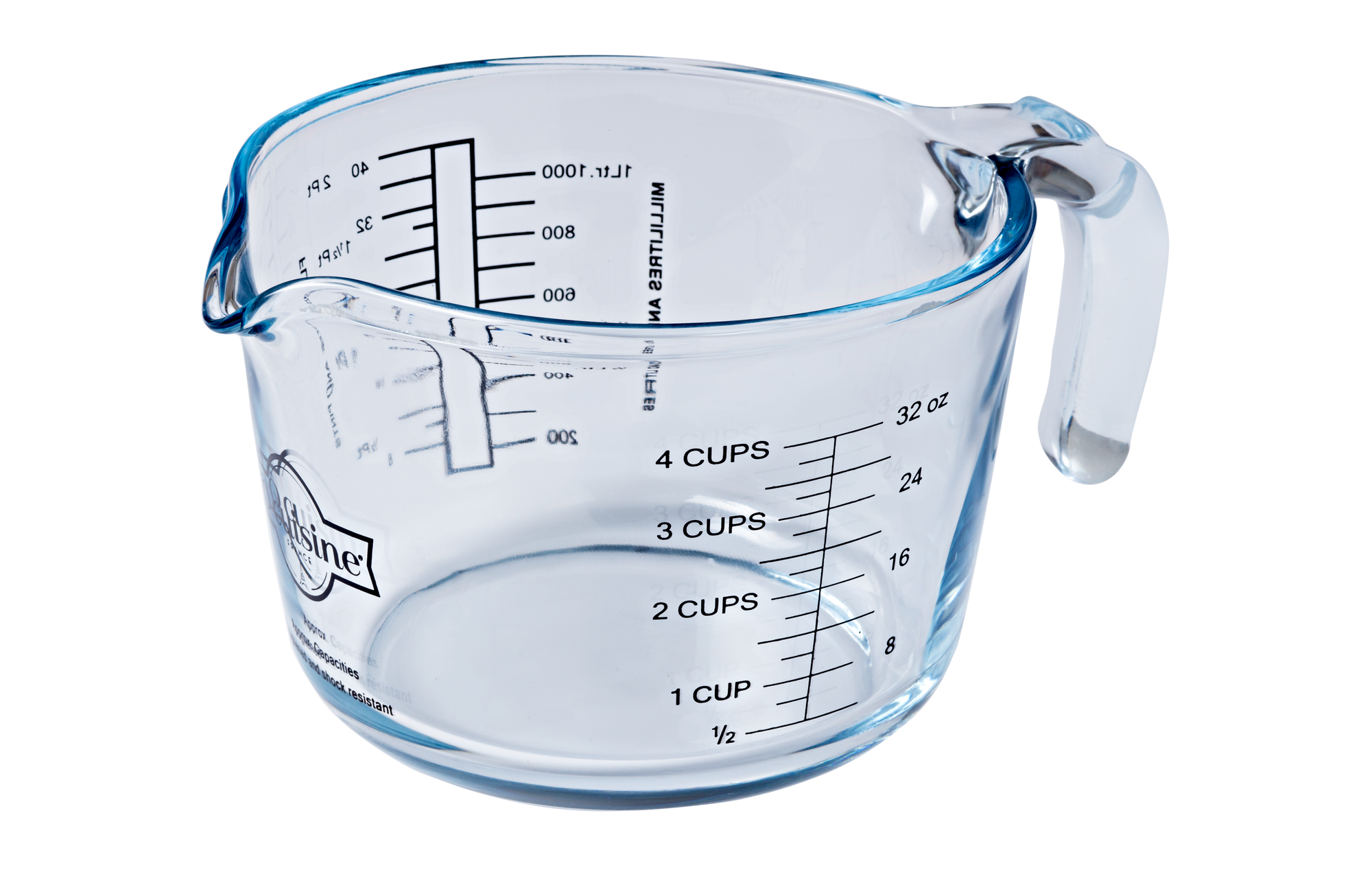 Clear ÔCuisine measuring cup with  measurement markings on a white background